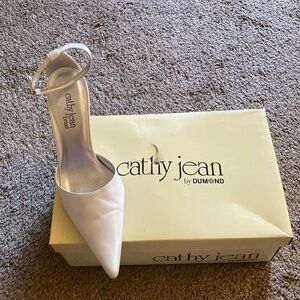 Cathy Jean made in Brazil.Size 7, 31/2”heel,white upper leather.Worn a few hours